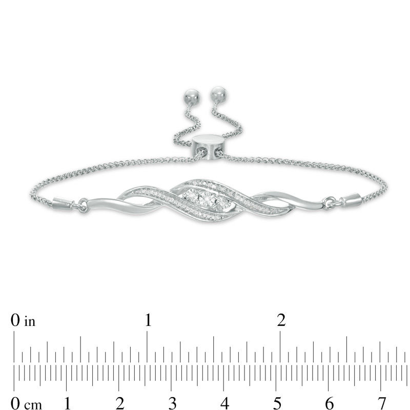 Main Image 2 of 0.066 CT. T.W. Diamond Three Stone Twist Bolo Bracelet in Sterling Silver - 9.5"