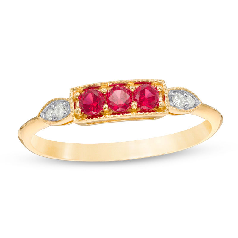 Lab-Created Ruby and Diamond Accent Vintage-Style Three Stone Ring in 10K Gold