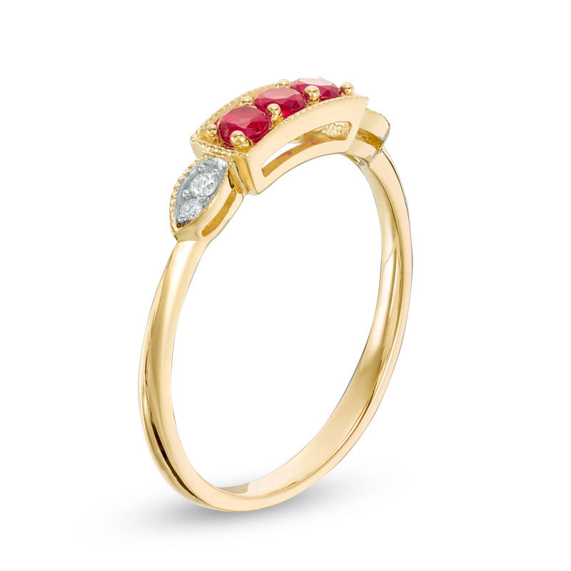 Lab-Created Ruby and Diamond Accent Vintage-Style Three Stone Ring in 10K Gold