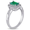 Thumbnail Image 1 of Emerald-Cut Lab-Created Emerald and 0.05 CT. T.W. Diamond Frame Ring in Sterling Silver