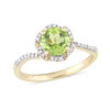 Thumbnail Image 1 of 7.0mm Peridot and 0.10 CT. T.W. Diamond Floral Frame Bypass Ring in 14K Gold