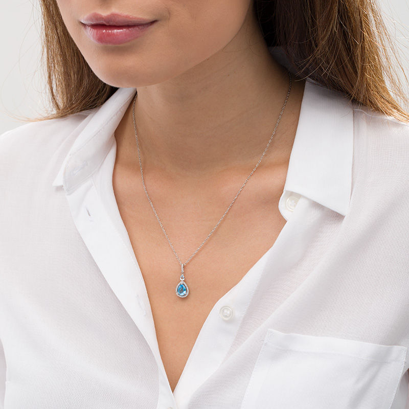 Pear-Shaped Swiss and Sky Blue Topaz with Lab-Created White Sapphire Frame Drop Pendant in Sterling Silver