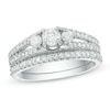 Thumbnail Image 0 of 0.95 CT. T.W. Diamond Three Stone Bridal Set in 10K White Gold