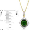 Thumbnail Image 1 of Oval Chrome Diopside, White Sapphire and 0.09 CT. T.W. Diamond Frame Pendant in 14K Gold - 17"