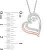 Unstoppable Love™ Diamond Accent Tilted Heart Pendant in Sterling Silver and 10K Rose Gold