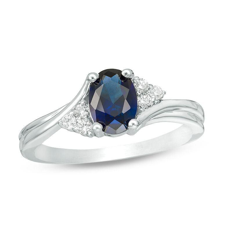 Oval Lab-Created Blue Sapphire and 0.085 CT. T.W. Diamond Tri-Sides Promise Ring in 10K White Gold