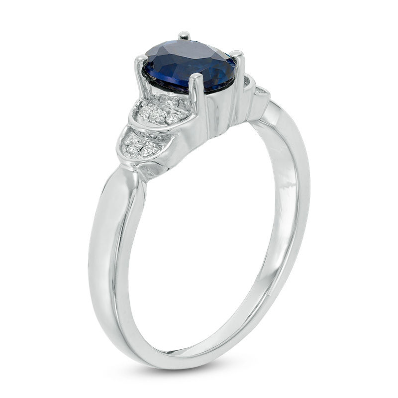 Oval Lab-Created Blue Sapphire and 0.065 CT. T.W. Diamond Layered Shank Promise Ring in 10K White Gold