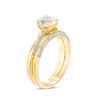 Thumbnail Image 1 of 5.7mm Lab-Created White Sapphire and 0.18 CT. T.W. Diamond Bridal Set in 10K Gold