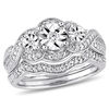 Thumbnail Image 0 of 0.24 CT. T.W. Diamond Three Stone Frame Twist Bridal Set in Sterling Silver