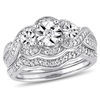 Thumbnail Image 1 of 0.24 CT. T.W. Diamond Three Stone Frame Twist Bridal Set in Sterling Silver