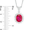 Thumbnail Image 1 of Oval Lab-Created Ruby and White Sapphire Sunburst Frame Pendant in Sterling Silver