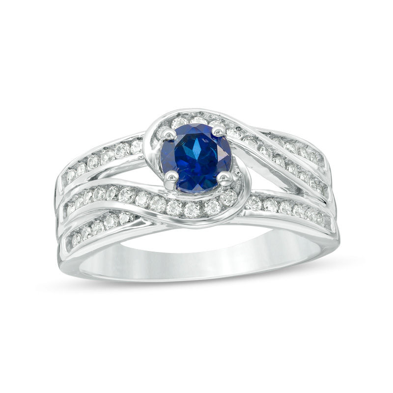 5.0mm Lab-Created Blue Sapphire and 0.29 CT. T.W. Diamond Swirl Bypass Engagement Ring in Sterling Silver