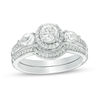 Thumbnail Image 0 of 5.0mm Lab-Created White Sapphire and 0.145 CT. T.W. Diamond Frame Bridal Set in Sterling Silver