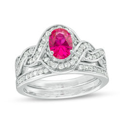 Oval Lab-Created Ruby and 0.45 CT. T.W. Diamond Braided Frame Bridal Set in Sterling Silver