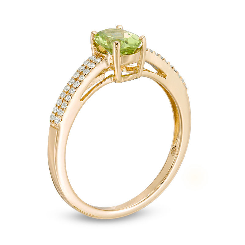 Main Image 2 of Oval Peridot and 0.116 CT. T.W. Diamond Double Row Ring in 14K Gold