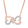 Thumbnail Image 0 of 0.086 CT. T.W. Diamond Love Knot Double Heart Necklace in 10K Rose Gold - 17.5"