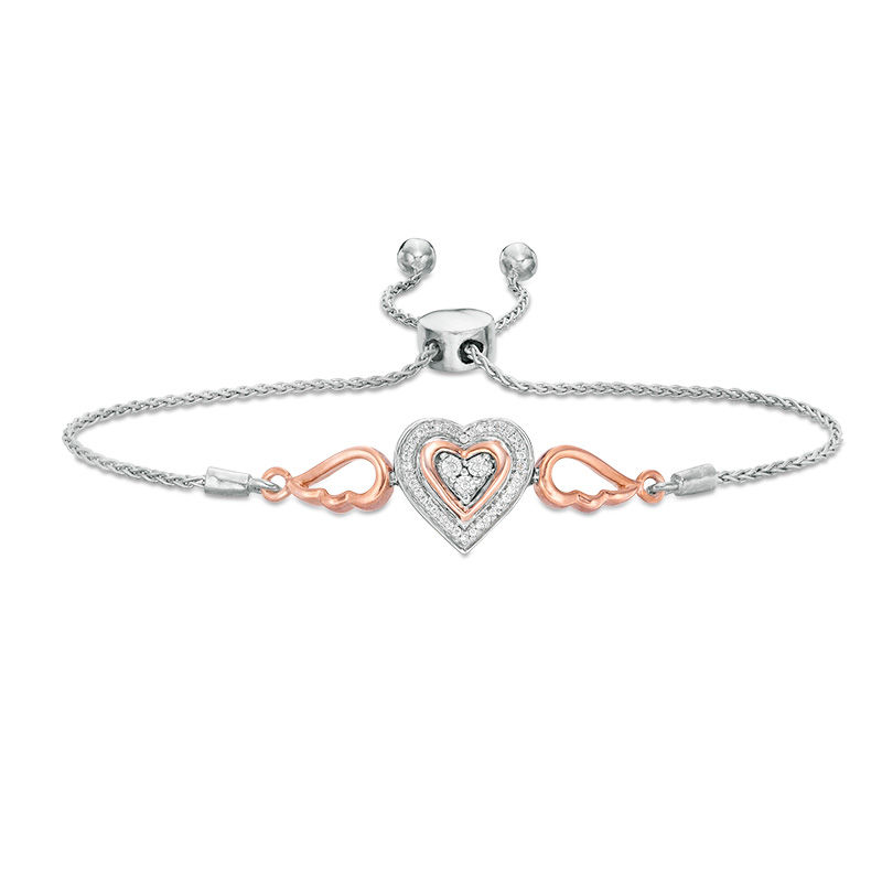 1/15 CT. T.W. Diamond Double Heart with Wings Bolo Bracelet in Sterling Silver and 10K Rose Gold (1 Line) - 9.5"