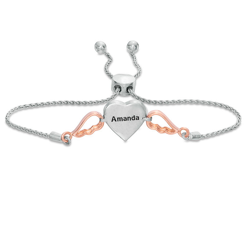 1/15 CT. T.W. Diamond Double Heart with Wings Bolo Bracelet in Sterling Silver and 10K Rose Gold (1 Line) - 9.5"
