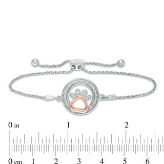 1/15 CT. T.W. Diamond Open Circle with Paw Print Bolo Bracelet in Sterling Silver and 10K Rose Gold (1 Line) - 9.5"
