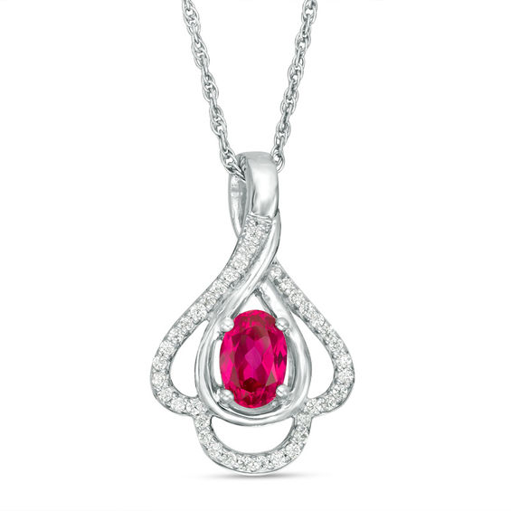 Oval Lab-Created Ruby and 0.148 CT. T.W. Diamond Teardrop Frame Leaf Pendant in 10K White Gold