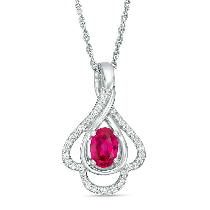 Oval Lab-Created Ruby and 0.148 CT. T.W. Diamond Teardrop Frame Leaf Pendant in 10K White Gold