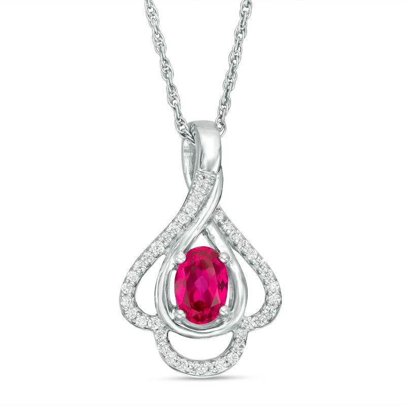 Oval Lab-Created Ruby and 0.148 CT. T.W. Diamond Teardrop Frame Leaf Pendant in 10K White Gold|Peoples Jewellers