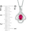 Thumbnail Image 1 of Oval Lab-Created Ruby and 0.148 CT. T.W. Diamond Teardrop Frame Leaf Pendant in 10K White Gold