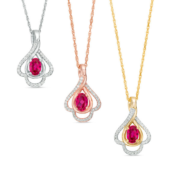 Oval Lab-Created Ruby and 0.148 CT. T.W. Diamond Teardrop Frame Leaf Pendant in 10K White, Yellow or Rose Gold