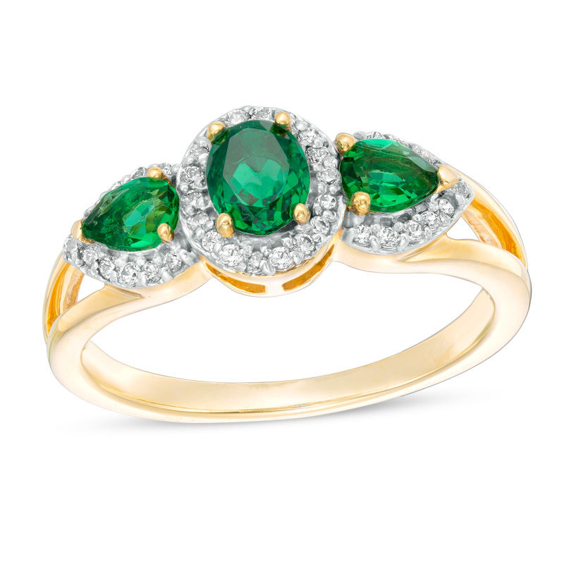 Oval and Pear-Shaped Lab-Created Emerald and 0.14 CT. T.W. Diamond Frame Three Stone Ring in 10K Gold