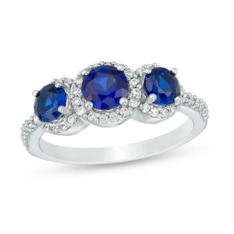 Lab-Created Blue Sapphire and 0.23 CT. T.W. Diamond Frame Three Stone Ring in 10K White Gold|Peoples Jewellers