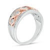 Thumbnail Image 1 of 0.18 CT. T.W. Diamond Infinity Twist Band in Sterling Silver and 10K Rose Gold