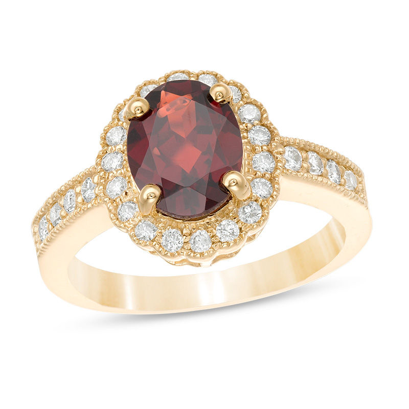 Oval Garnet and 0.34 CT. T.W. Diamond Scallop Frame Vintage-Style Ring in 10K Gold