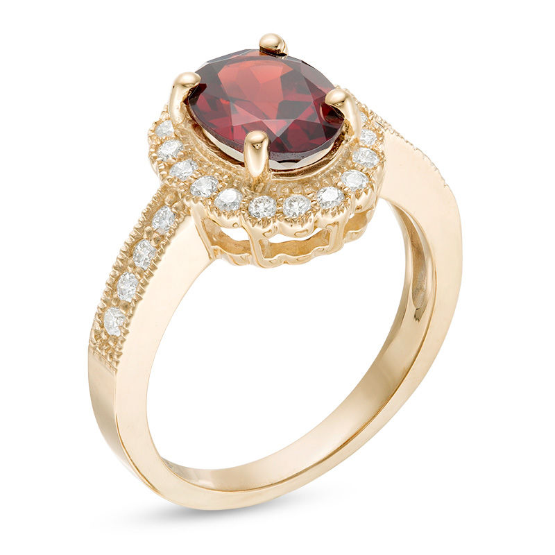 Main Image 2 of Oval Garnet and 0.34 CT. T.W. Diamond Scallop Frame Vintage-Style Ring in 10K Gold
