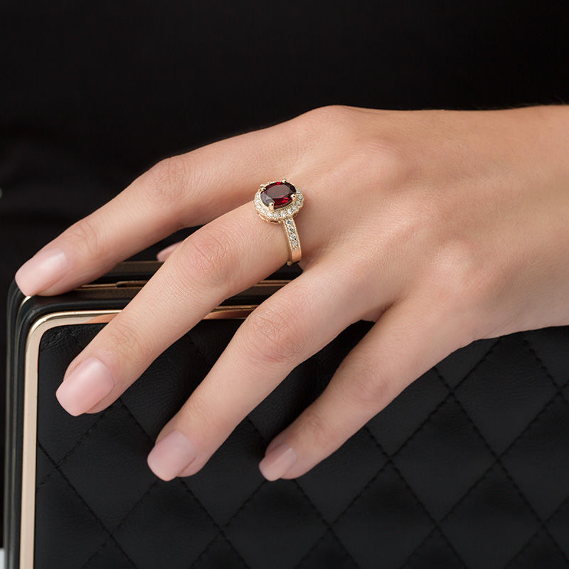 Main Image 3 of Oval Garnet and 0.34 CT. T.W. Diamond Scallop Frame Vintage-Style Ring in 10K Gold