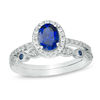Thumbnail Image 0 of Oval Lab-Created Blue and White Sapphire Frame Vintage-Style Bridal Set in 10K White Gold