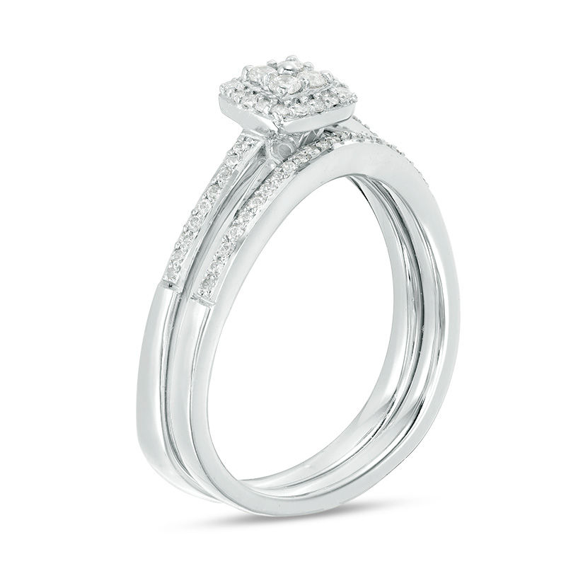 0.29 CT. T.W. Quad Diamond Frame Bridal Set in 10K White Gold