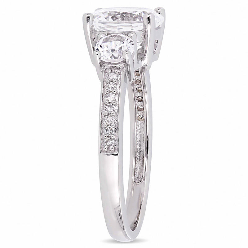 Main Image 2 of Lab-Created White Sapphire and 0.07 CT. T.W. Diamond Three Stone Engagement Ring in 10K White Gold