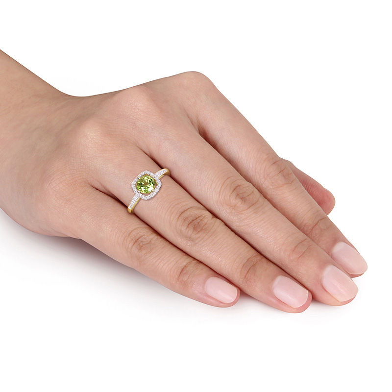 6.0mm Peridot and 0.144 CT. T.W. Diamond Cushion Frame Ring in 10K Gold