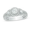 Thumbnail Image 1 of 0.88 CT. T.W. Certified Canadian Diamond Three Stone Frame Vintage-Style Engagement Ring in 14K White Gold (I/I2)