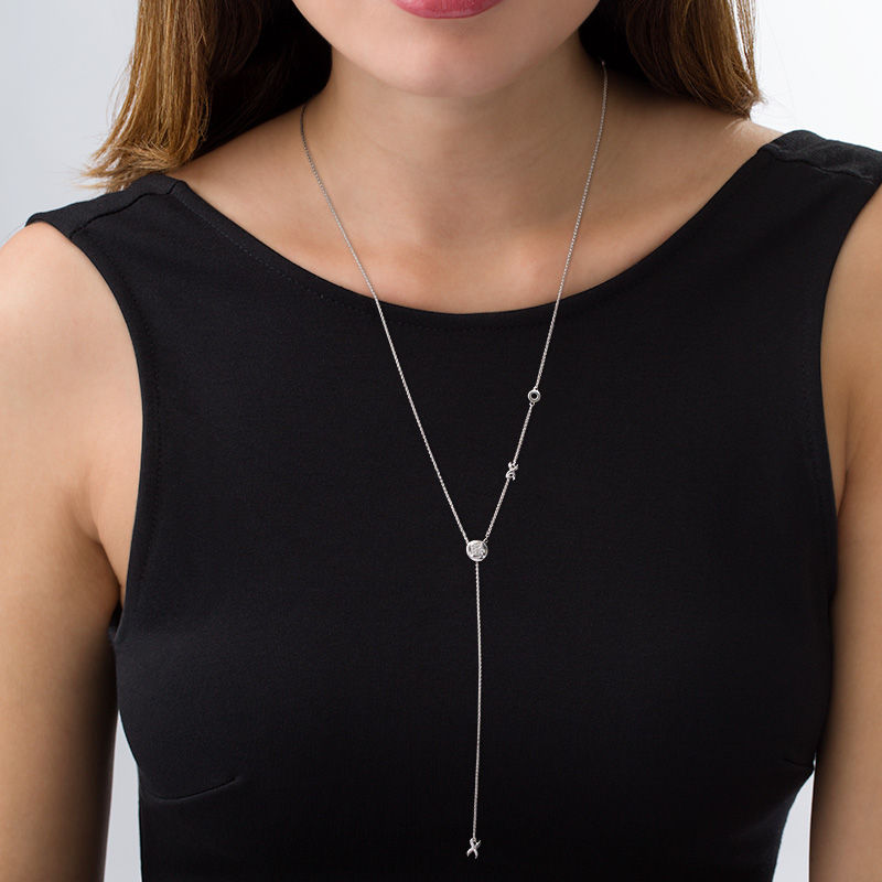 0.04 CT. T.W. Diamond "XO" Station Lariat Necklace in Sterling Silver - 26"