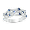 Thumbnail Image 0 of Bezel-Set Lab-Created Blue and White Sapphire Triple Row Orbit Ring in Sterling Silver