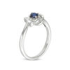 Thumbnail Image 1 of 4.0mm Lab-Created Blue Sapphire and 0.065 CT. T.W. Diamond Knot Frame Ring in Sterling Silver