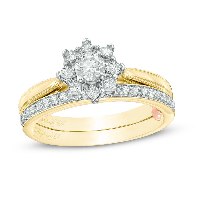 Main Image 1 of Perfect Fit 0.60 CT. T.W. Diamond Starburst Frame Interlocking Bridal Set in 14K Gold