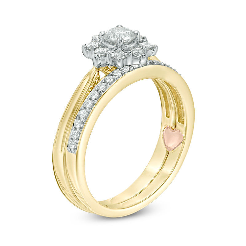 Main Image 2 of Perfect Fit 0.60 CT. T.W. Diamond Starburst Frame Interlocking Bridal Set in 14K Gold