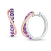 Thumbnail Image 1 of Amethyst and 0.067 CT. T.W. Diamond Crossover Ribbon Hoop Earrings in Sterling Silver and 10K Rose Gold
