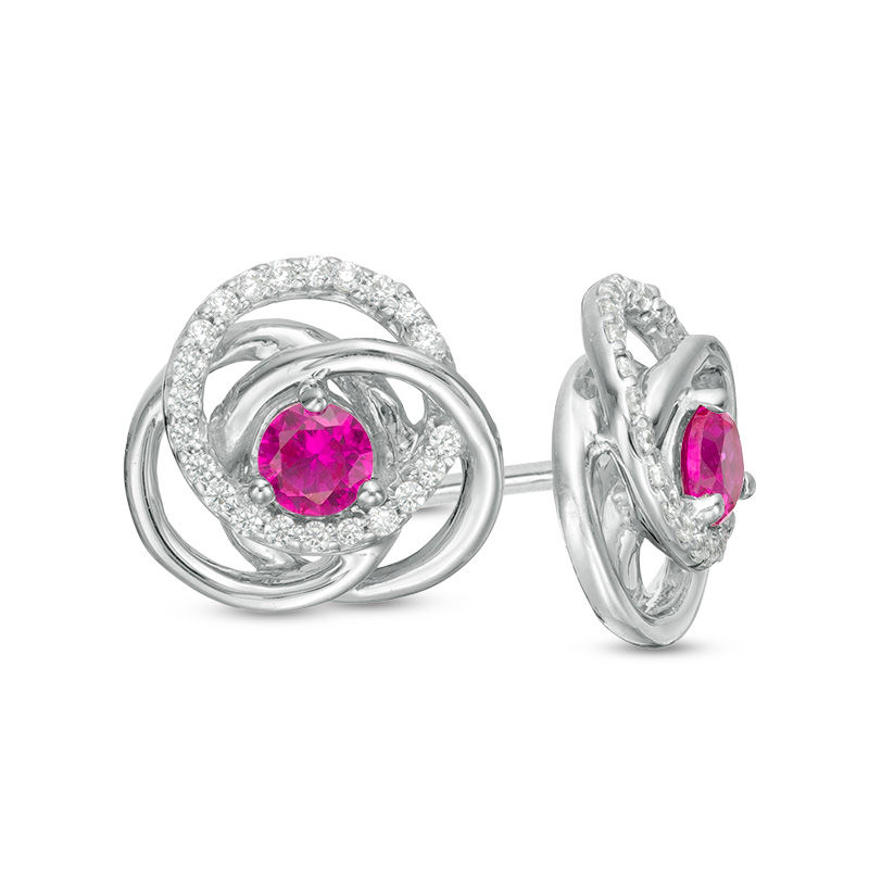 3.0mm Lab-Created Ruby and 0.116 CT. T.W. Diamond Love Knot Frame Stud Earrings in Sterling Silver