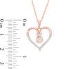0.086 CT. T.W. Diamond Love Knot Heart Pendant in 10K Rose Gold