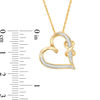 0.067 CT. T.W. Diamond Infinity Knot Tilted Heart Pendant in Sterling Silver with 14K Gold Plate