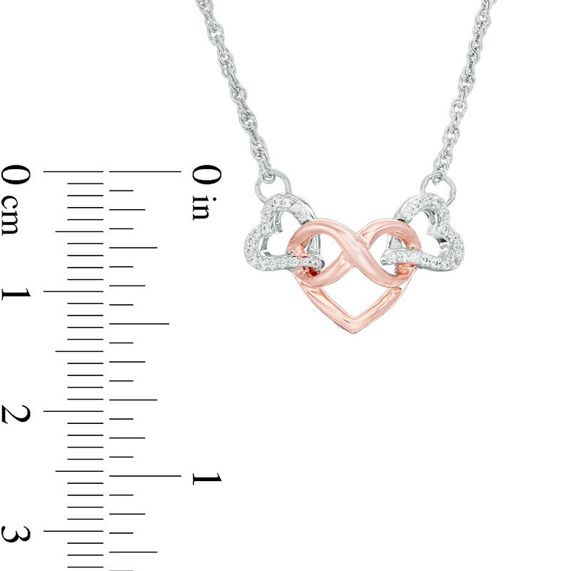 0.085 CT. T.W. Diamond Infinity Heart Interlocking Necklace in Sterling Silver and 10K Rose Gold - 17.38"