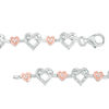 Thumbnail Image 2 of 0.23 CT. T.W. Diamond Infinity Love Knot Bracelet in Sterling Silver and 10K Rose Gold